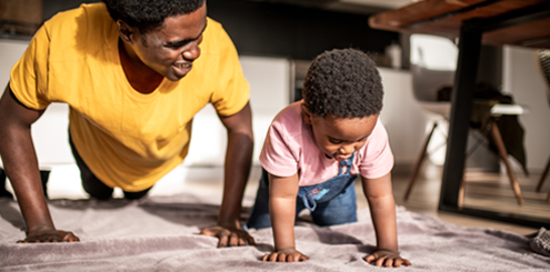 Man and son doing push-ups