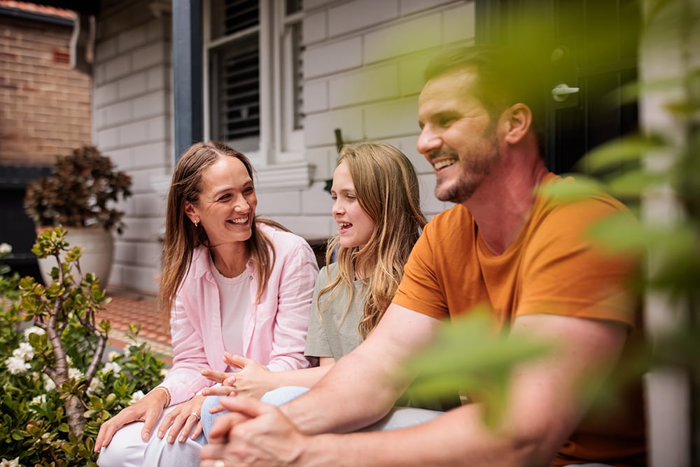51_Family_Talking_Doorstep